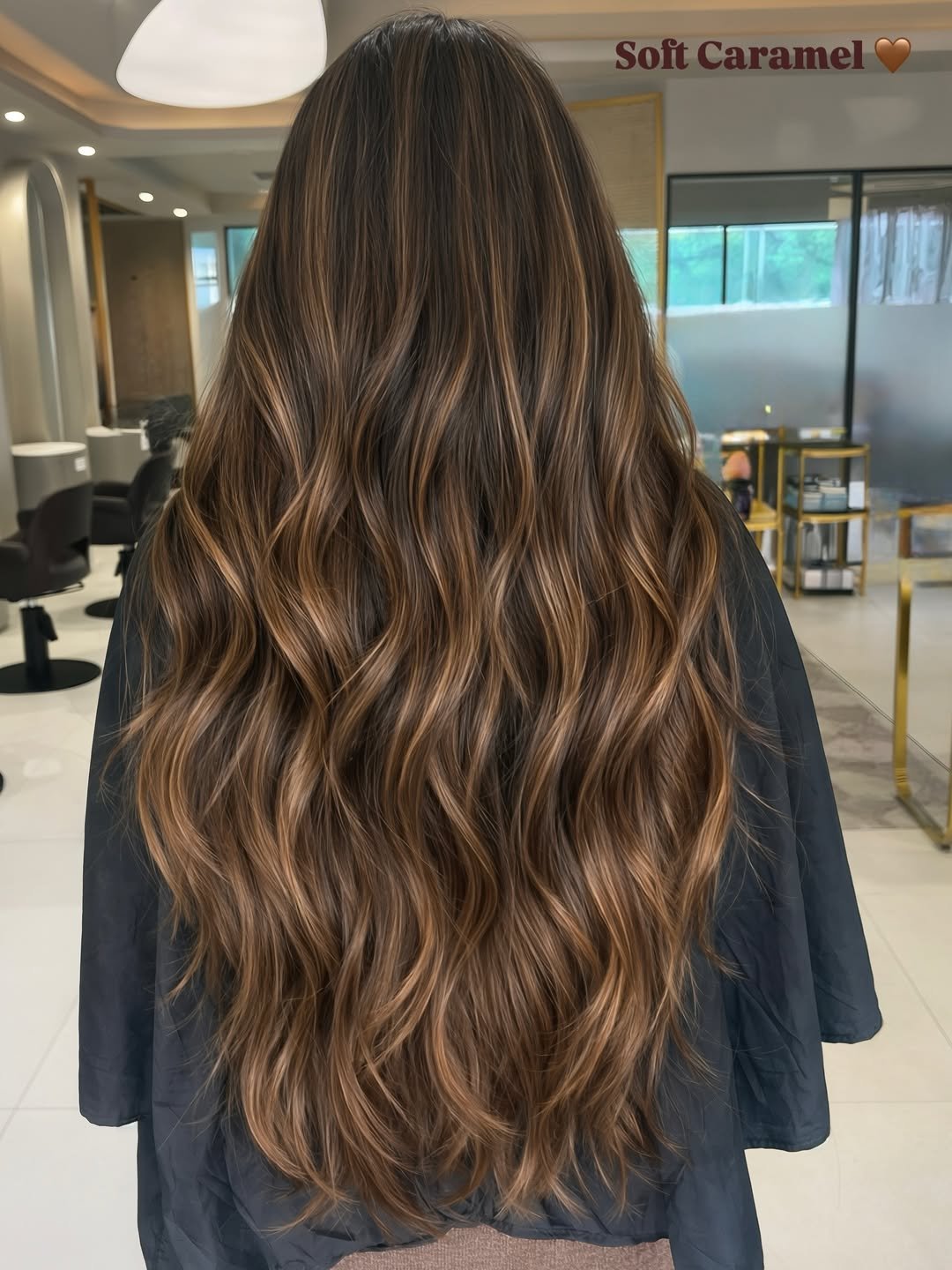Blonde balayage on brunette hair by expert colourist at luxury salon Gurgaon