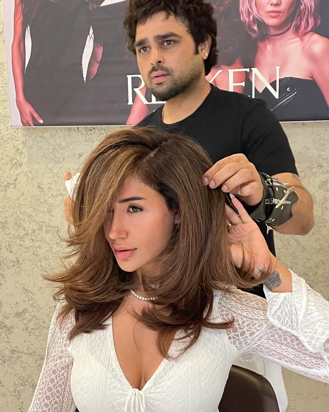 Stylist giving a precision haircut at Studio 17